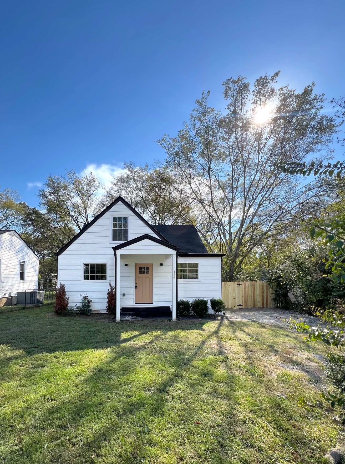 a view of a house with a yard