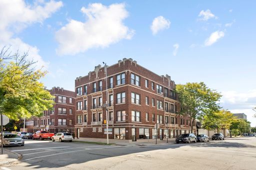 a view of a building with a street