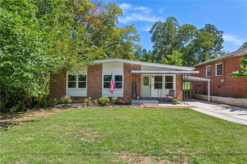 front view of a house with a yard