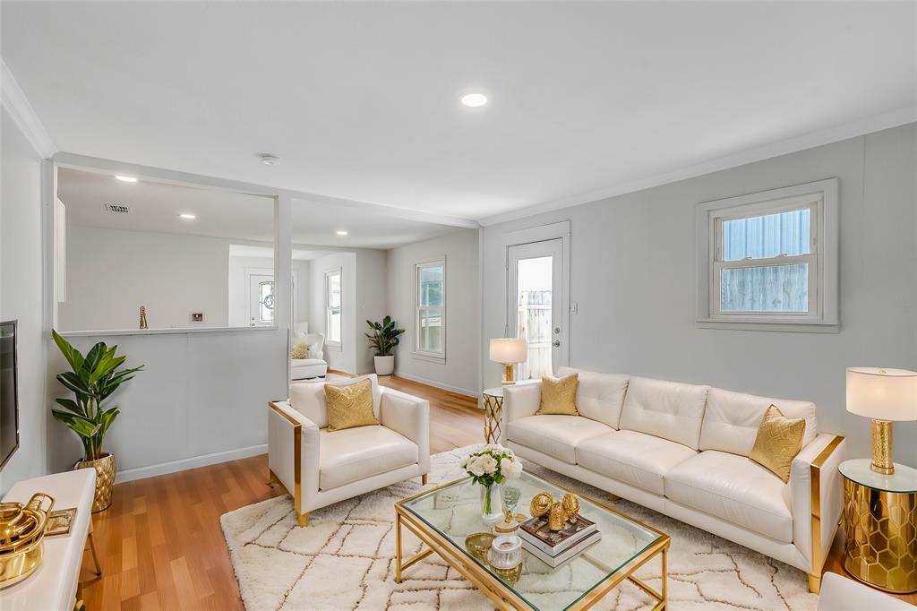 a living room with furniture and a couch