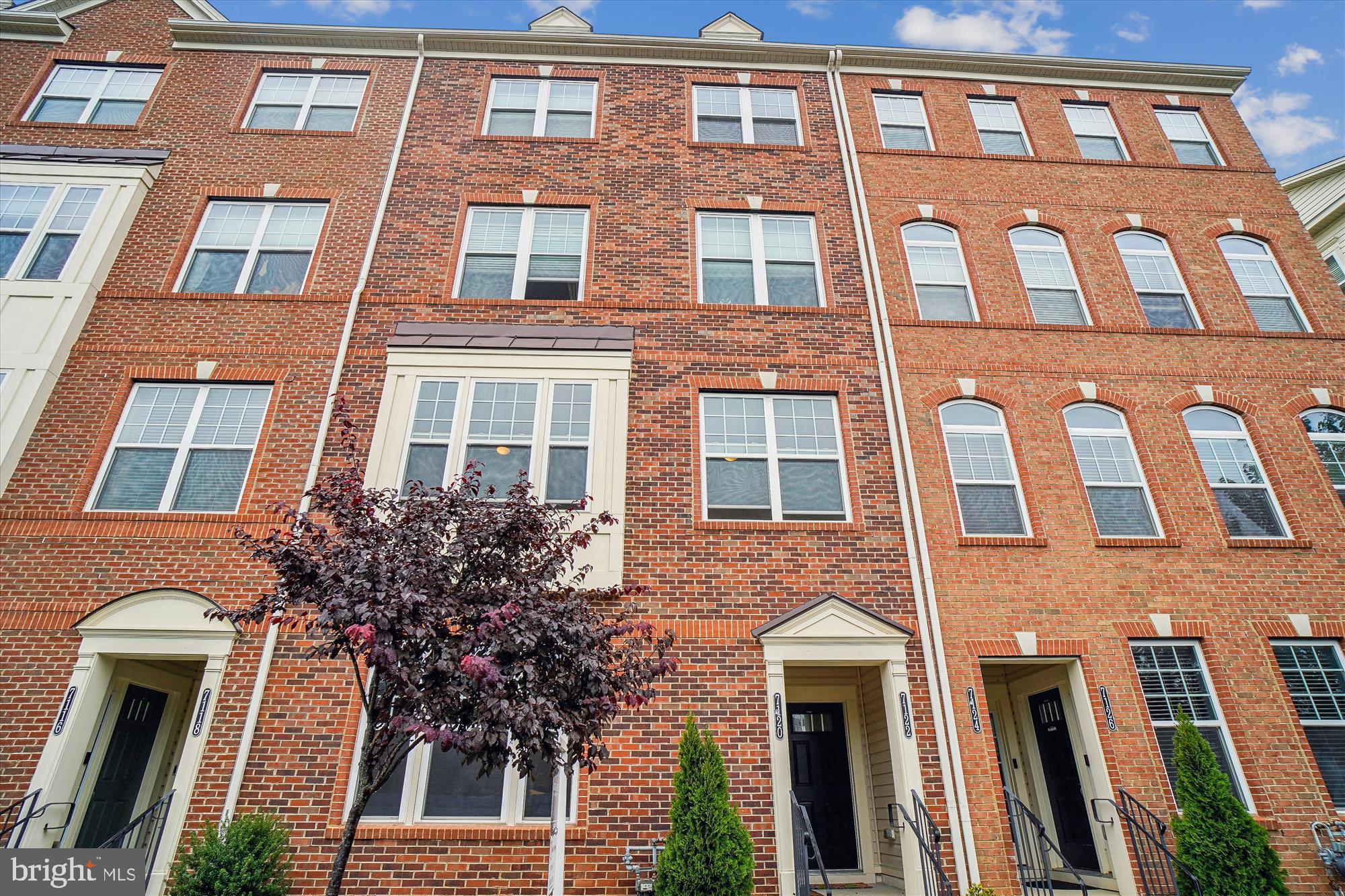 a front view of a multi story residential apartment building