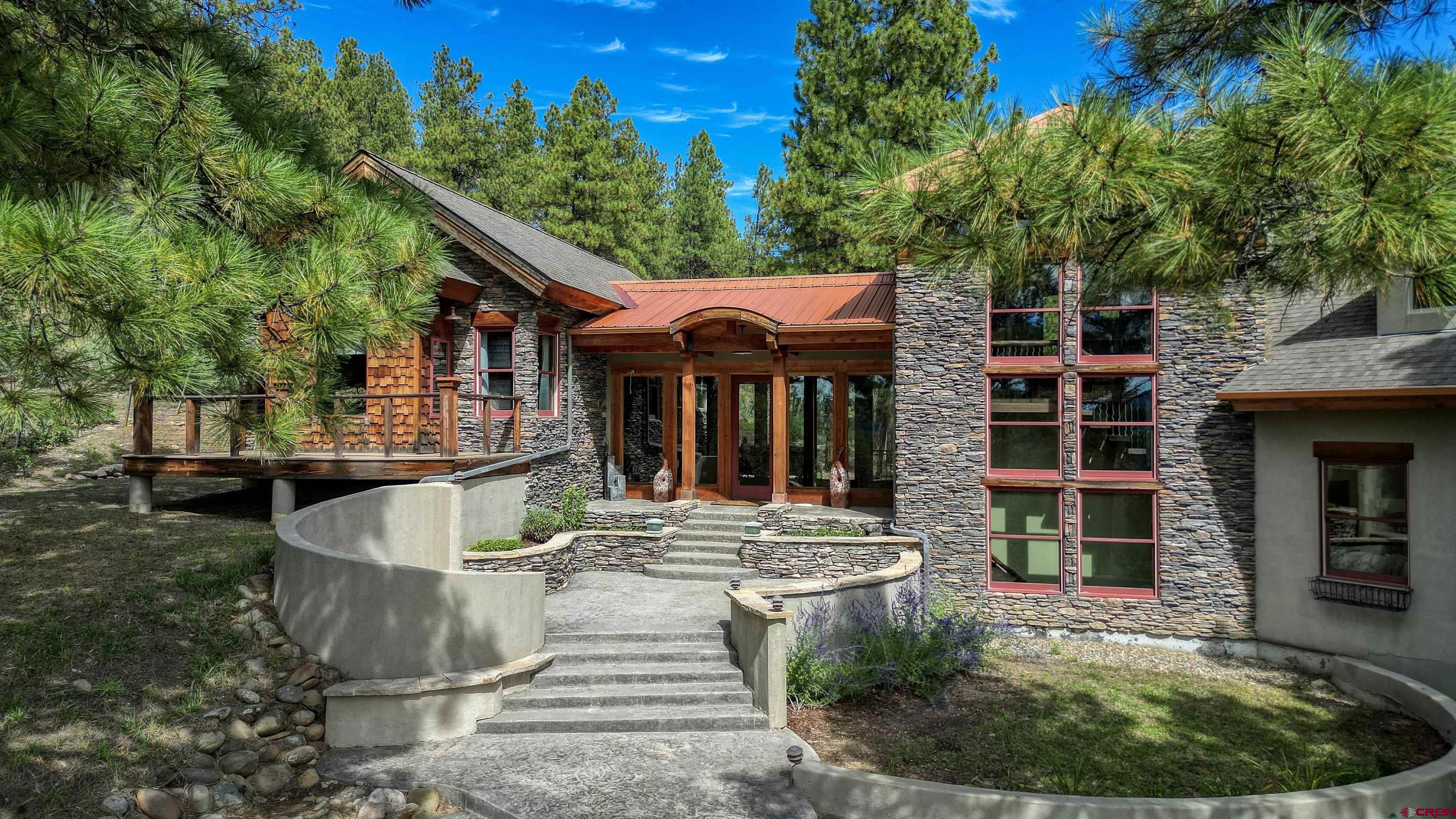 a view of house and outdoor space with swimming pool