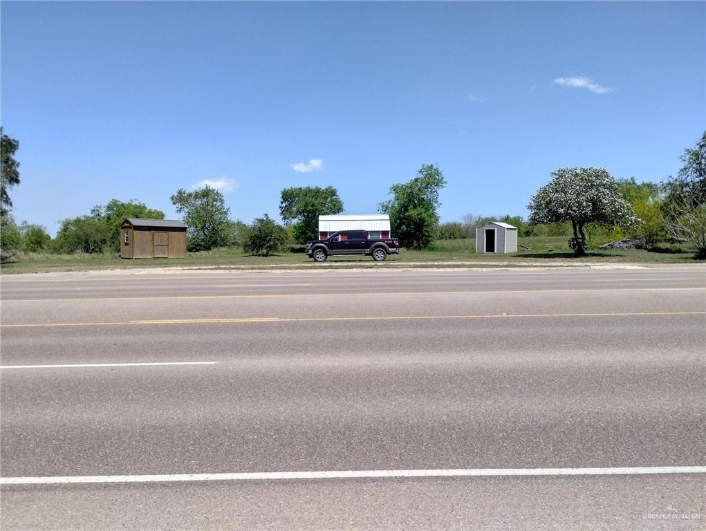 a view of a house and a yard