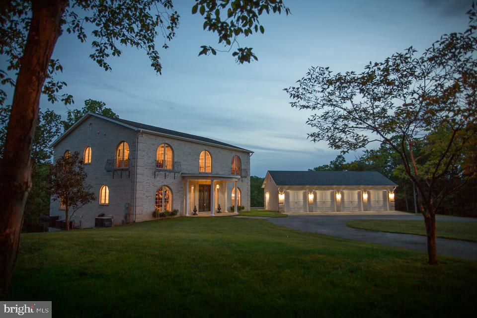 a view of a house with a big yard