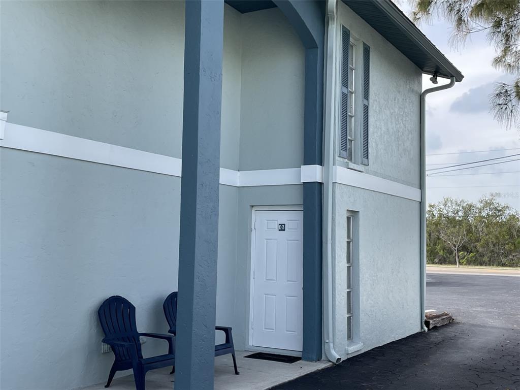 a view of balcony and chair