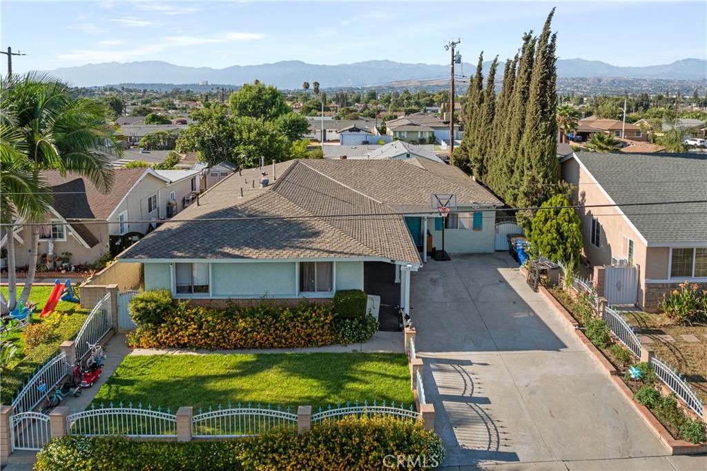 a aerial view of a house with a garden