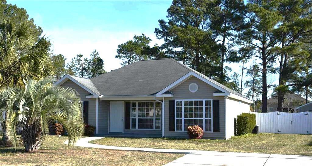 View of front of house featuring a front lawn