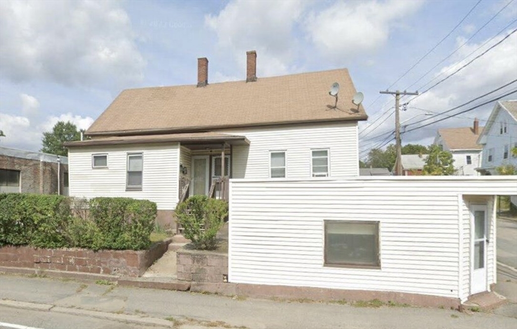 a view of a house with a white house