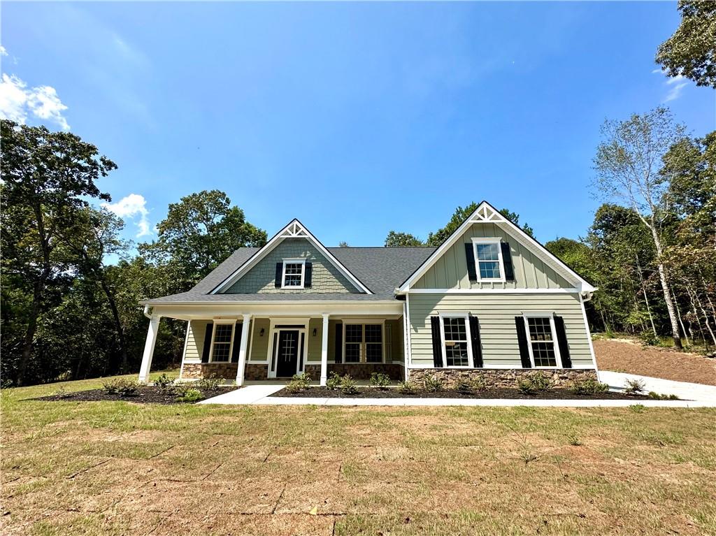 front view of a house with a yard