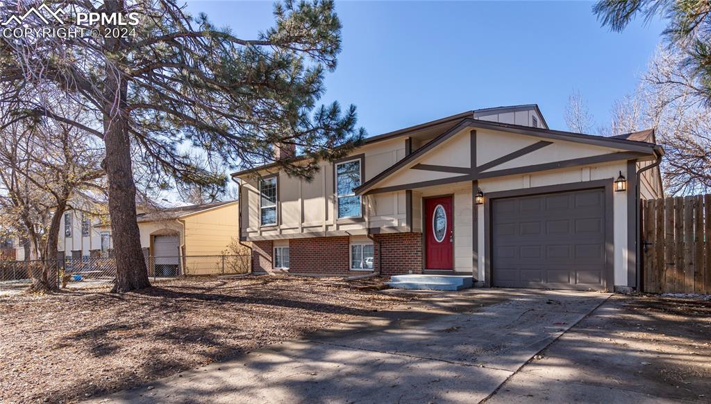 View of front of property with a garage