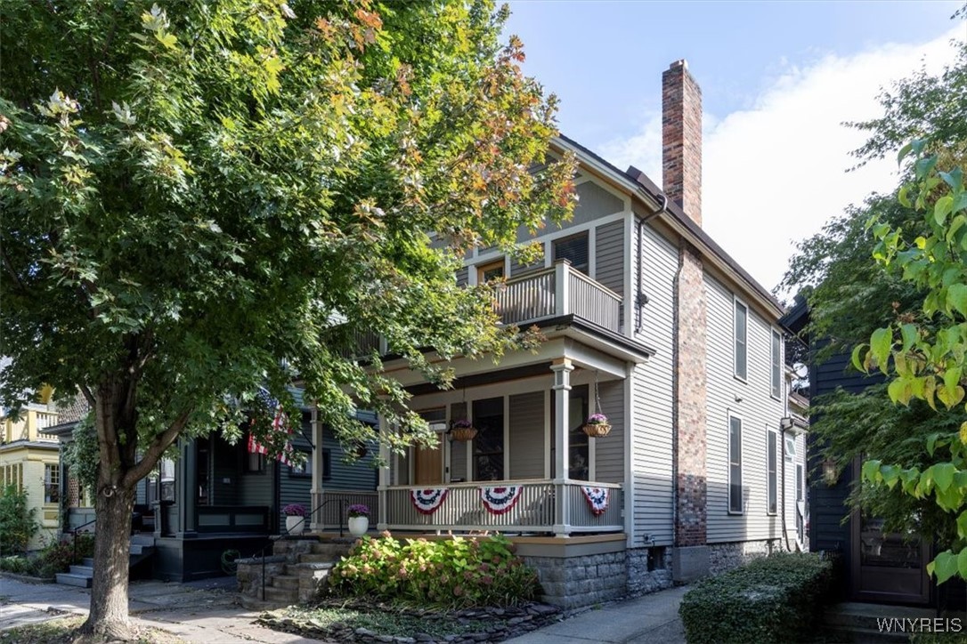 Front of home with cozy renovated porch