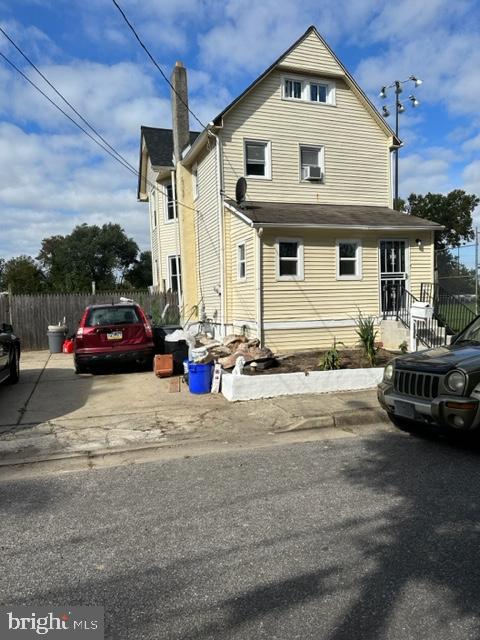 a car parked in front of a house