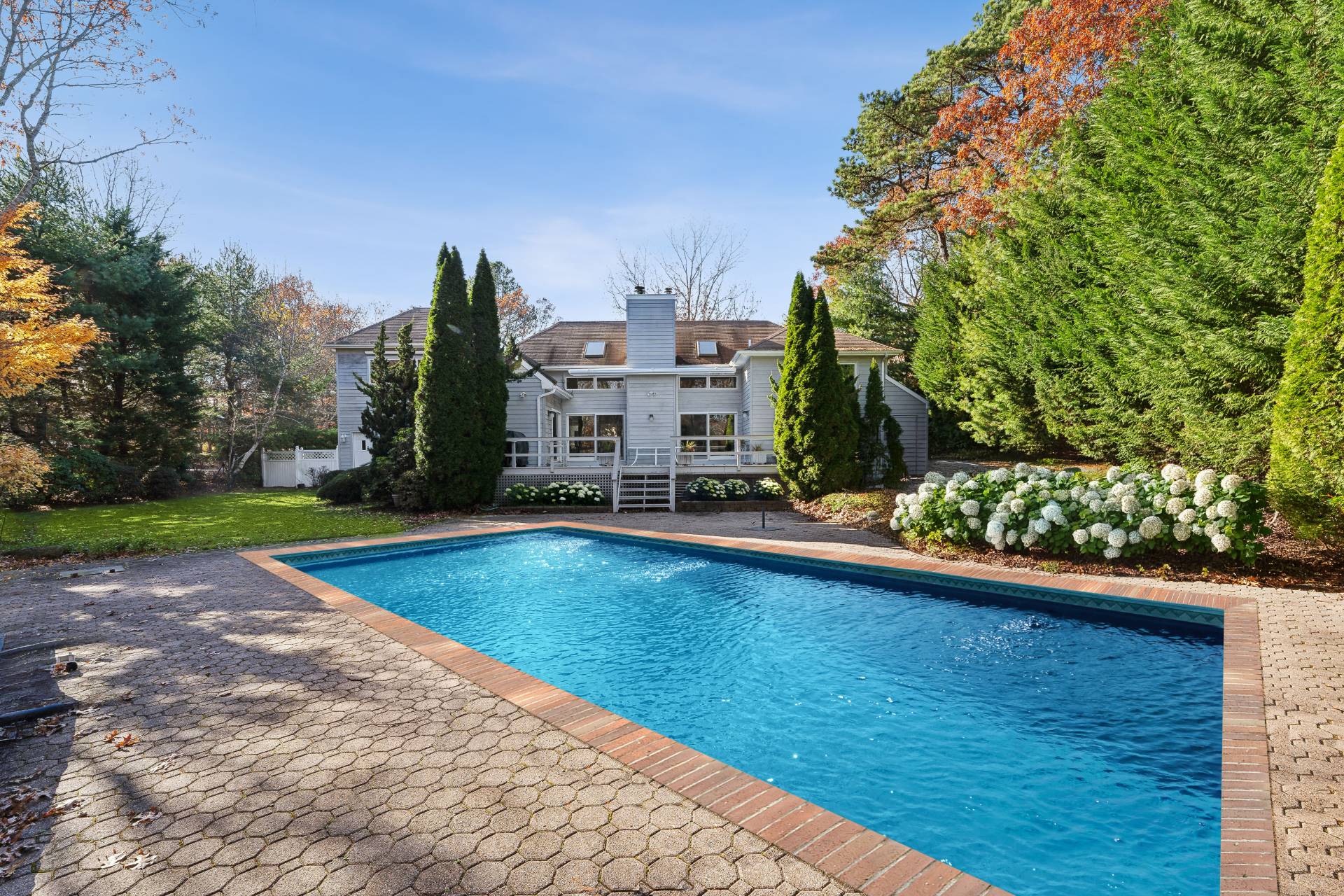 a view of swimming pool from a balcony