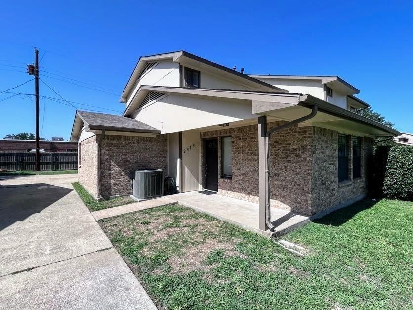 a front view of a house with yard