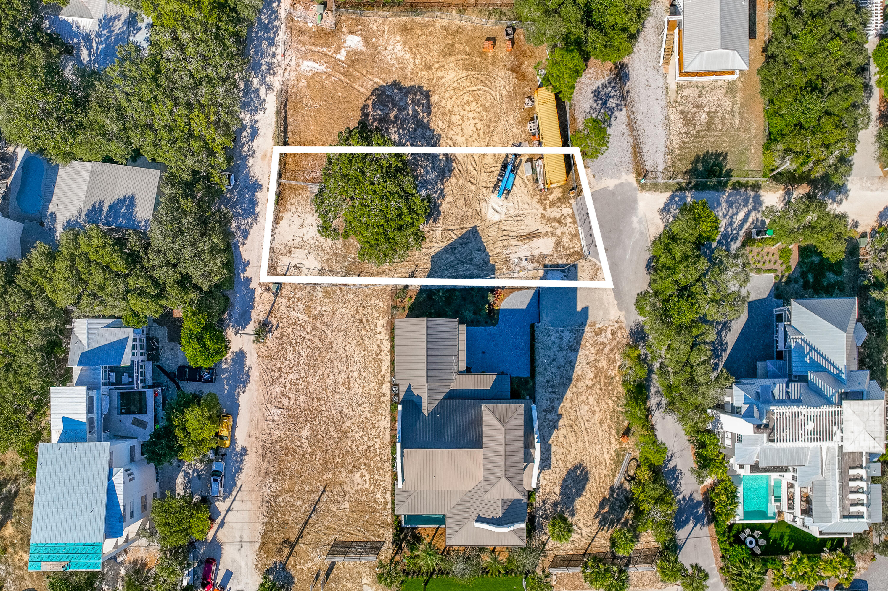 an aerial view of houses and roads