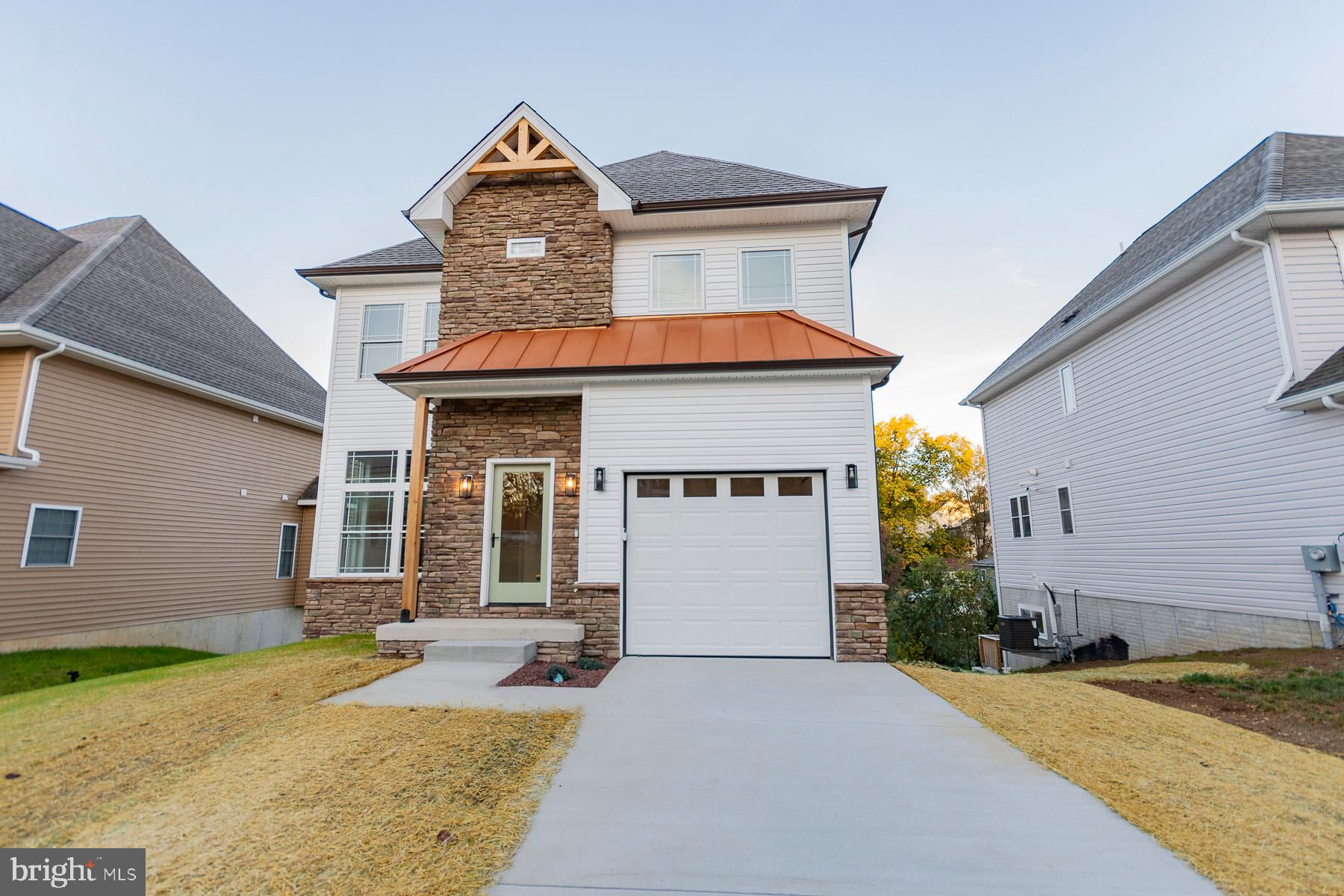 front view of a house with a patio