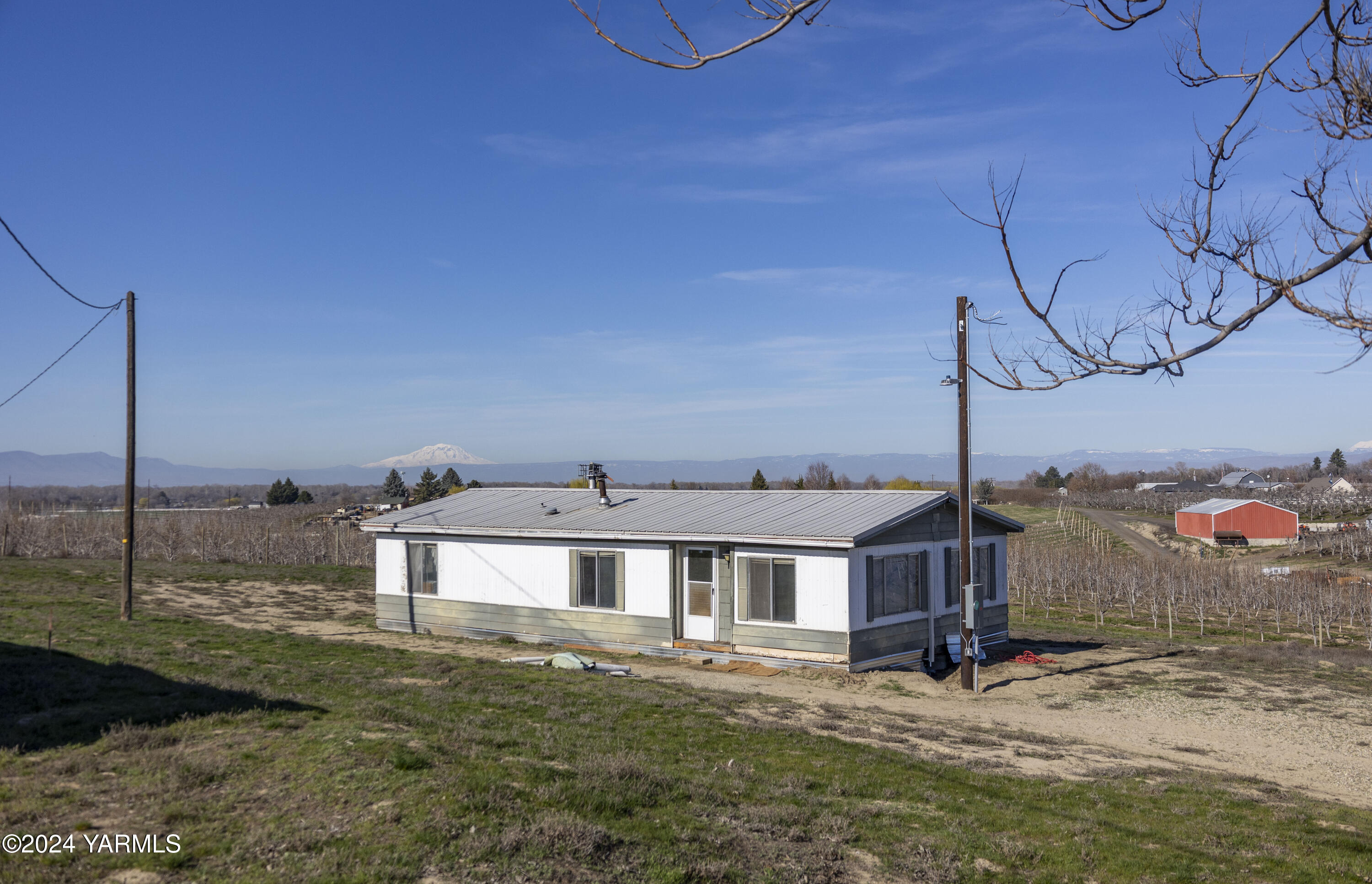 a view of a house with a park