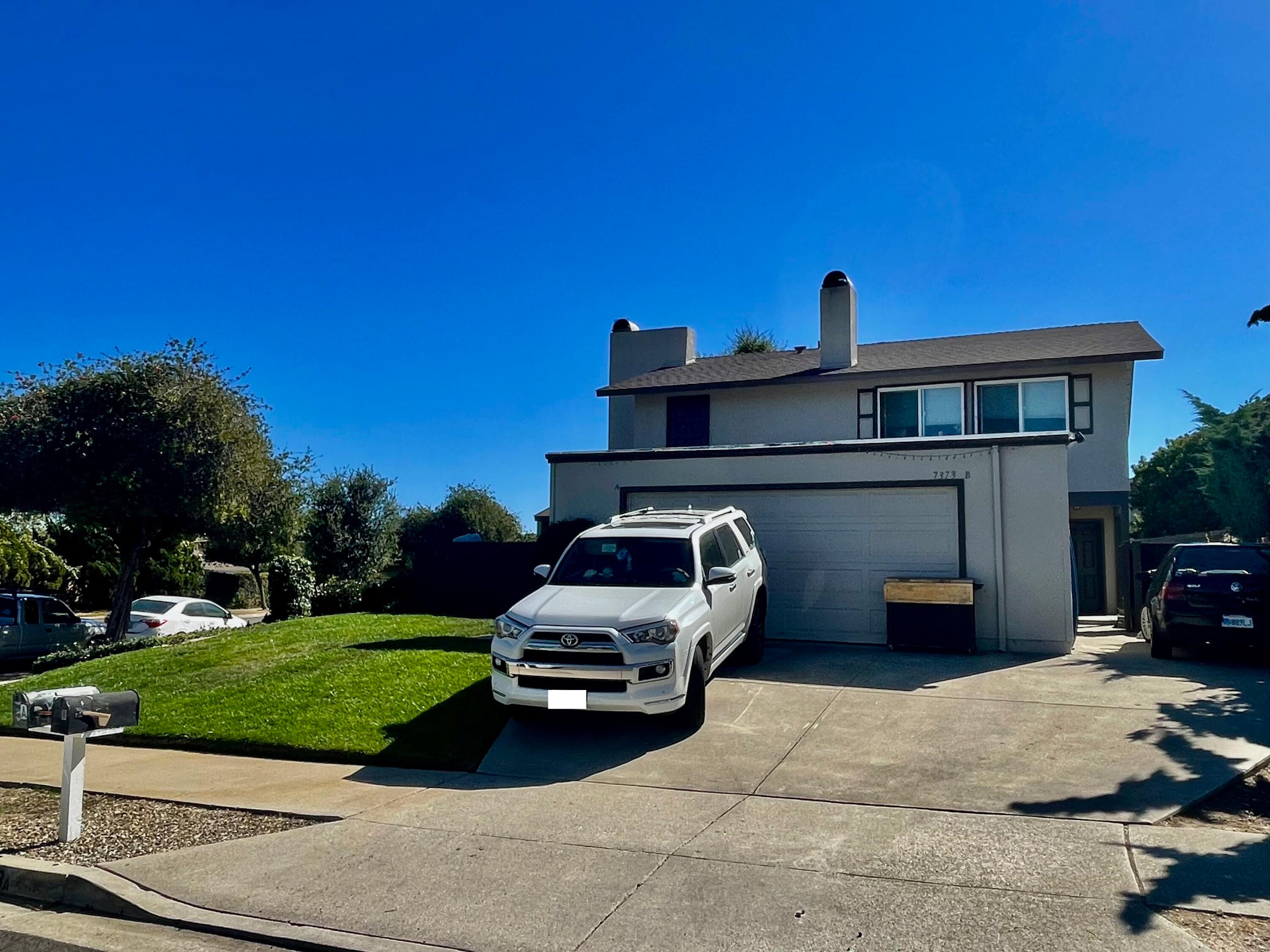 a car parked in front of house