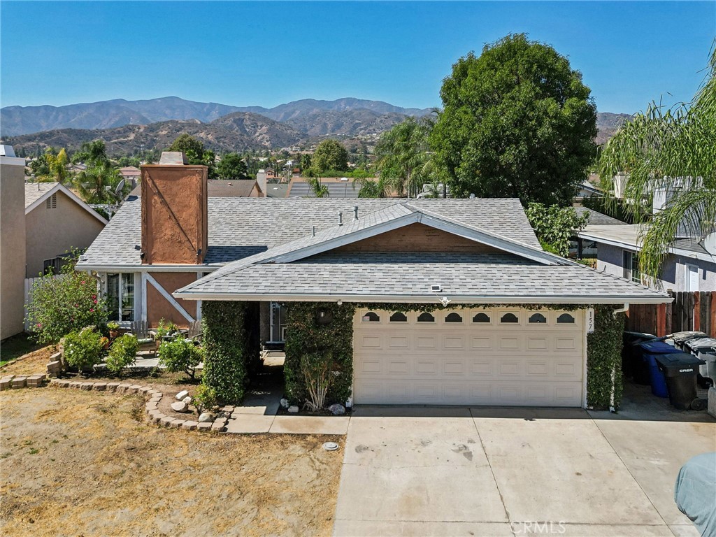 a view of house with outdoor space