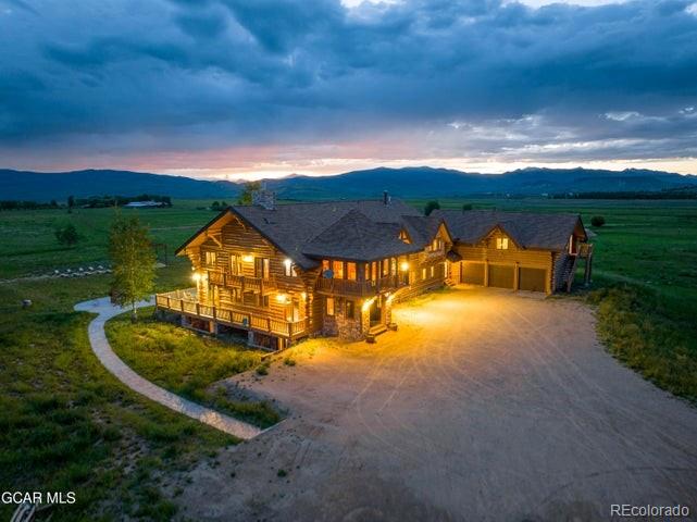 a view of a house with big yard