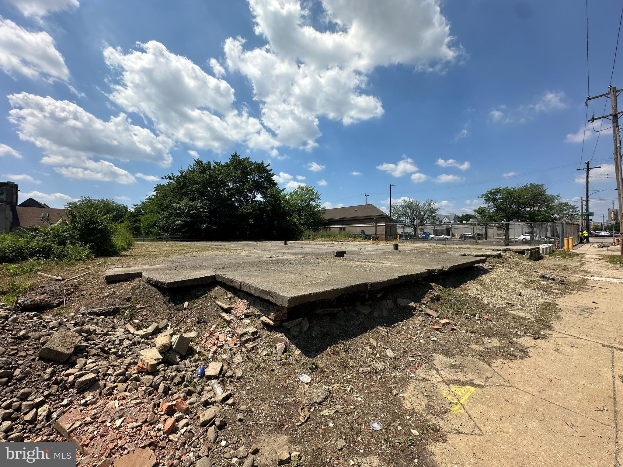 a view of a water fountain and a yard