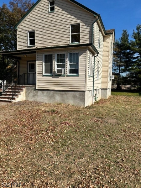 a front view of a house with garage