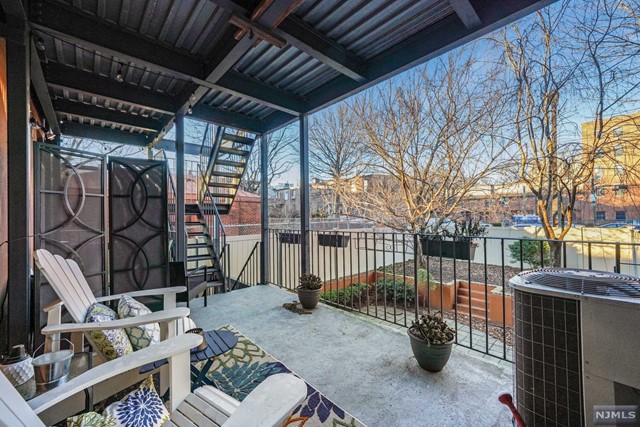 a view of a porch with furniture