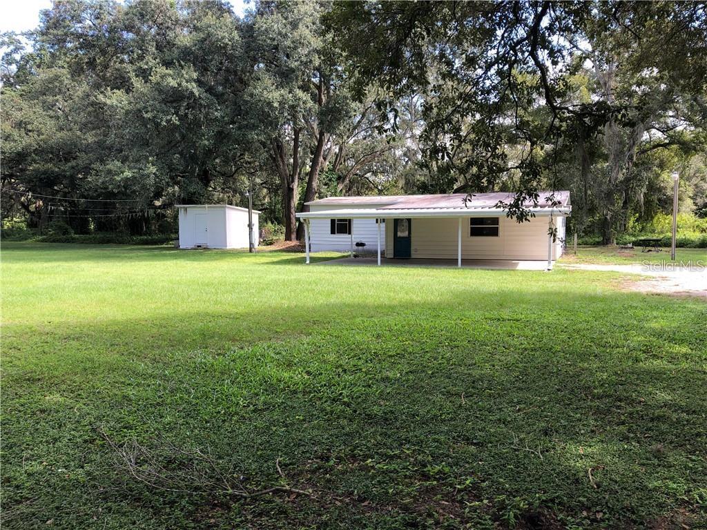 a house with a yard in front of it