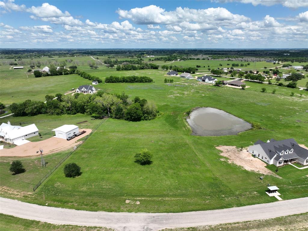 a view of a golf course with a garden