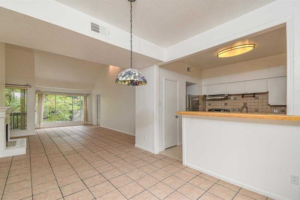 a view of a kitchen with a sink and dishwasher kitchen view