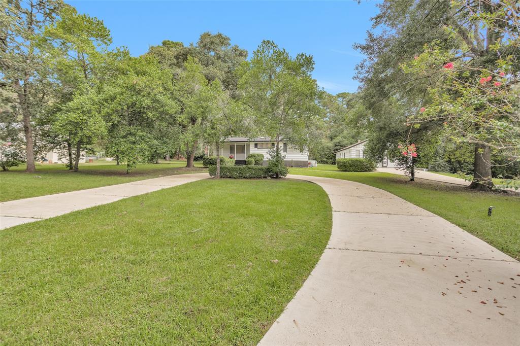 Circle driveway Plus 2nd Drive to Garage with possible guest quarters.