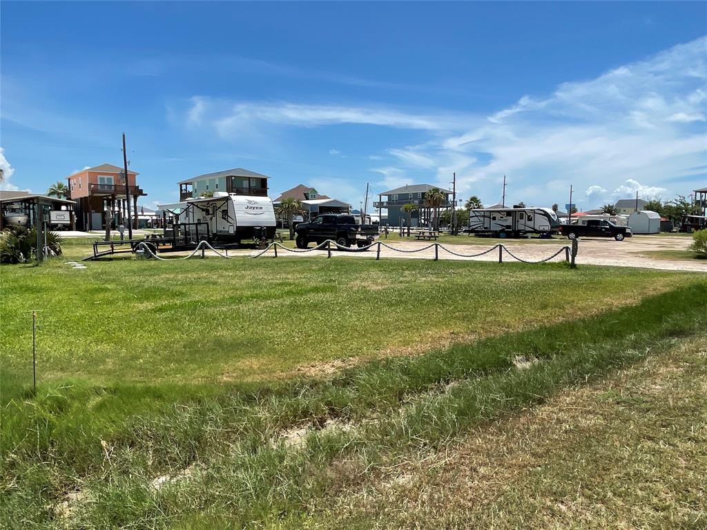 a group of cars parked in front of house