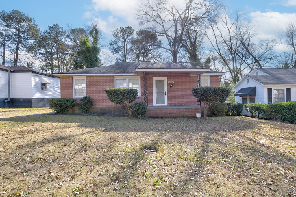 a house with trees in front of it