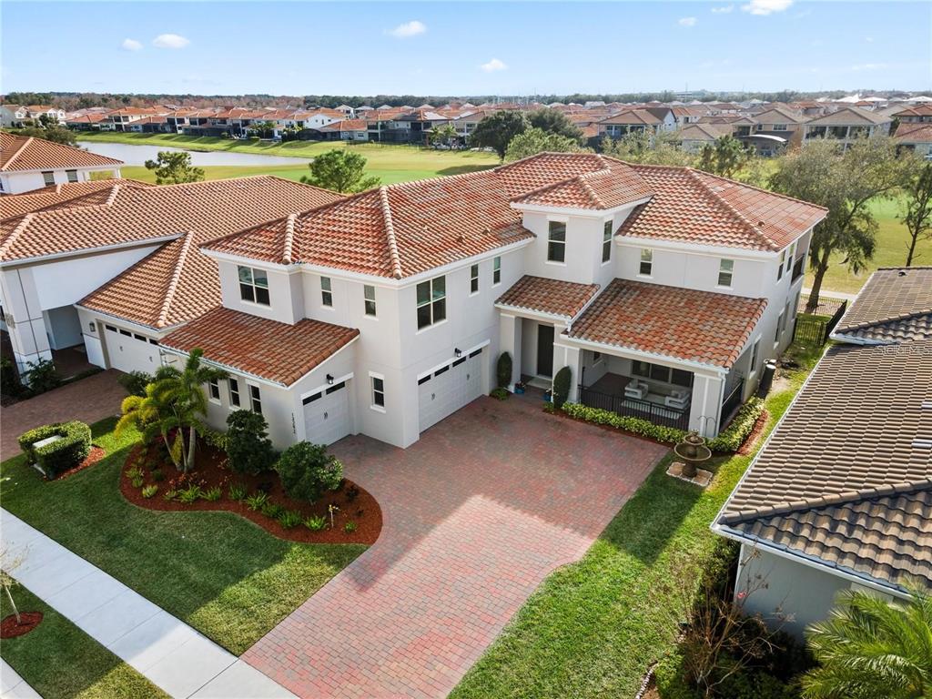 an aerial view of a house with a garden