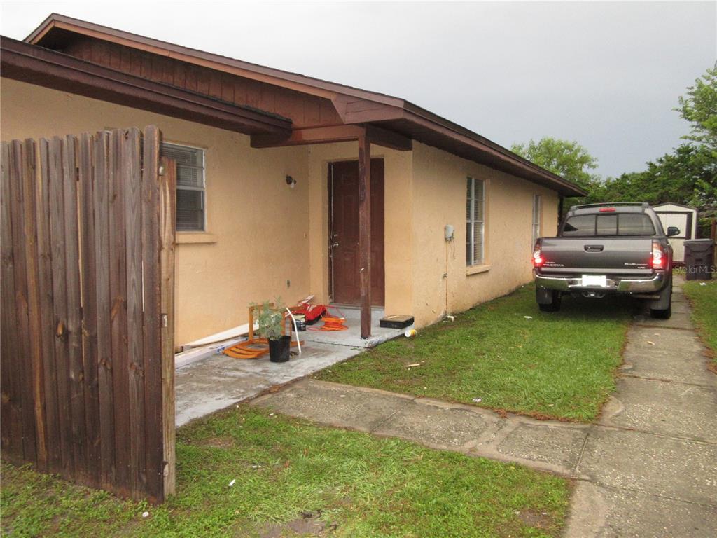 a view of backyard of house