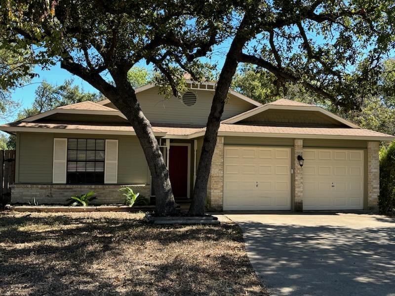 a front view of a house with yard