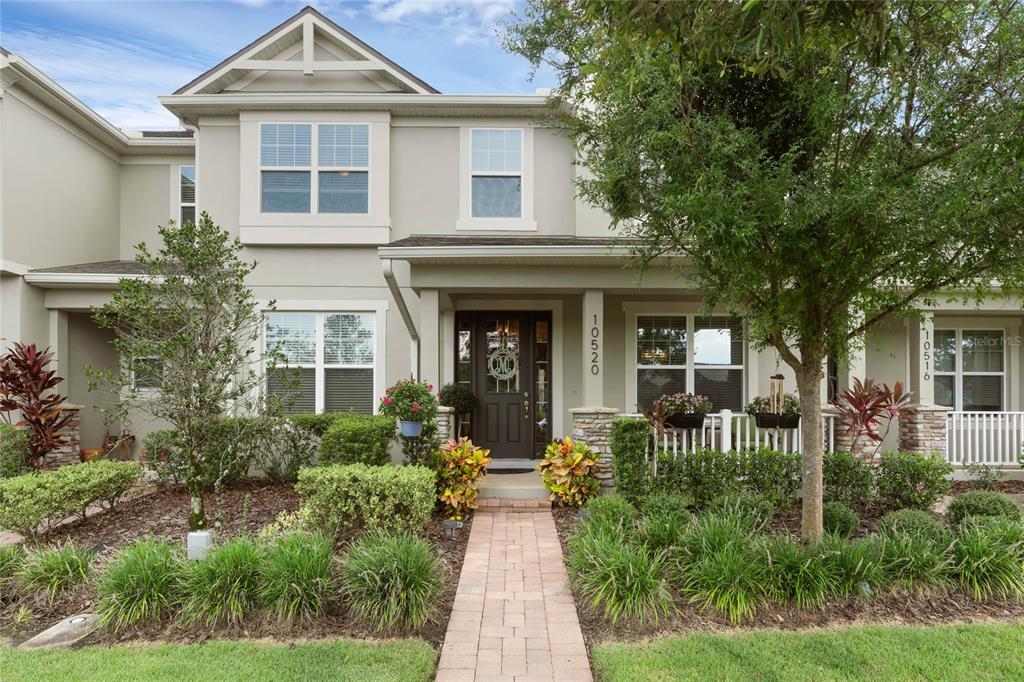 front view of a house with a yard