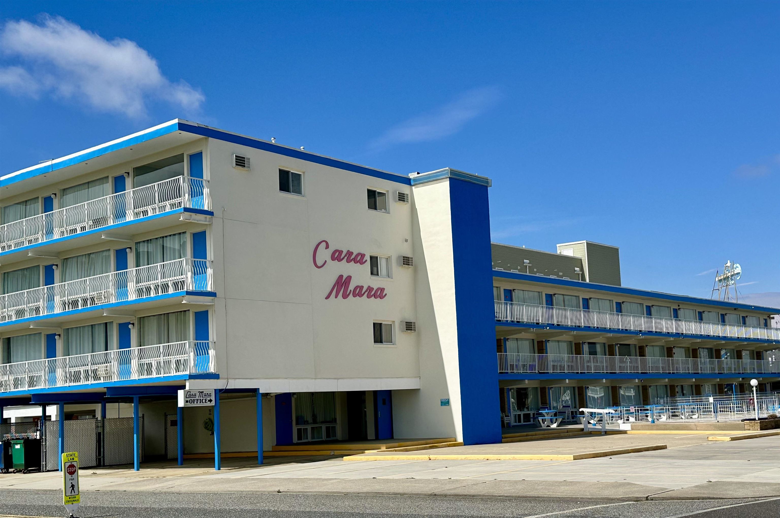 a front view of a building with street view