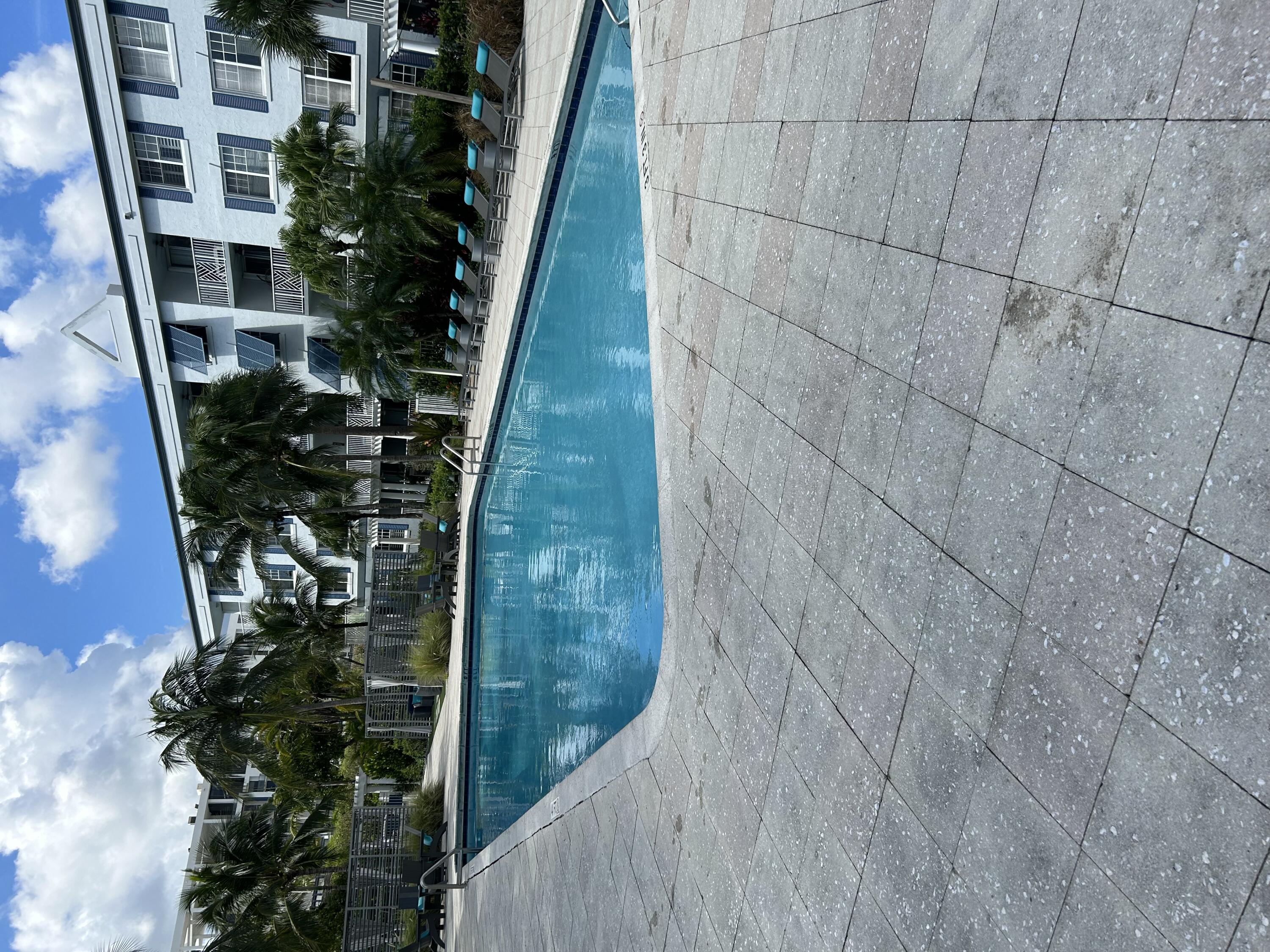 a view of a swimming pool and outdoor space