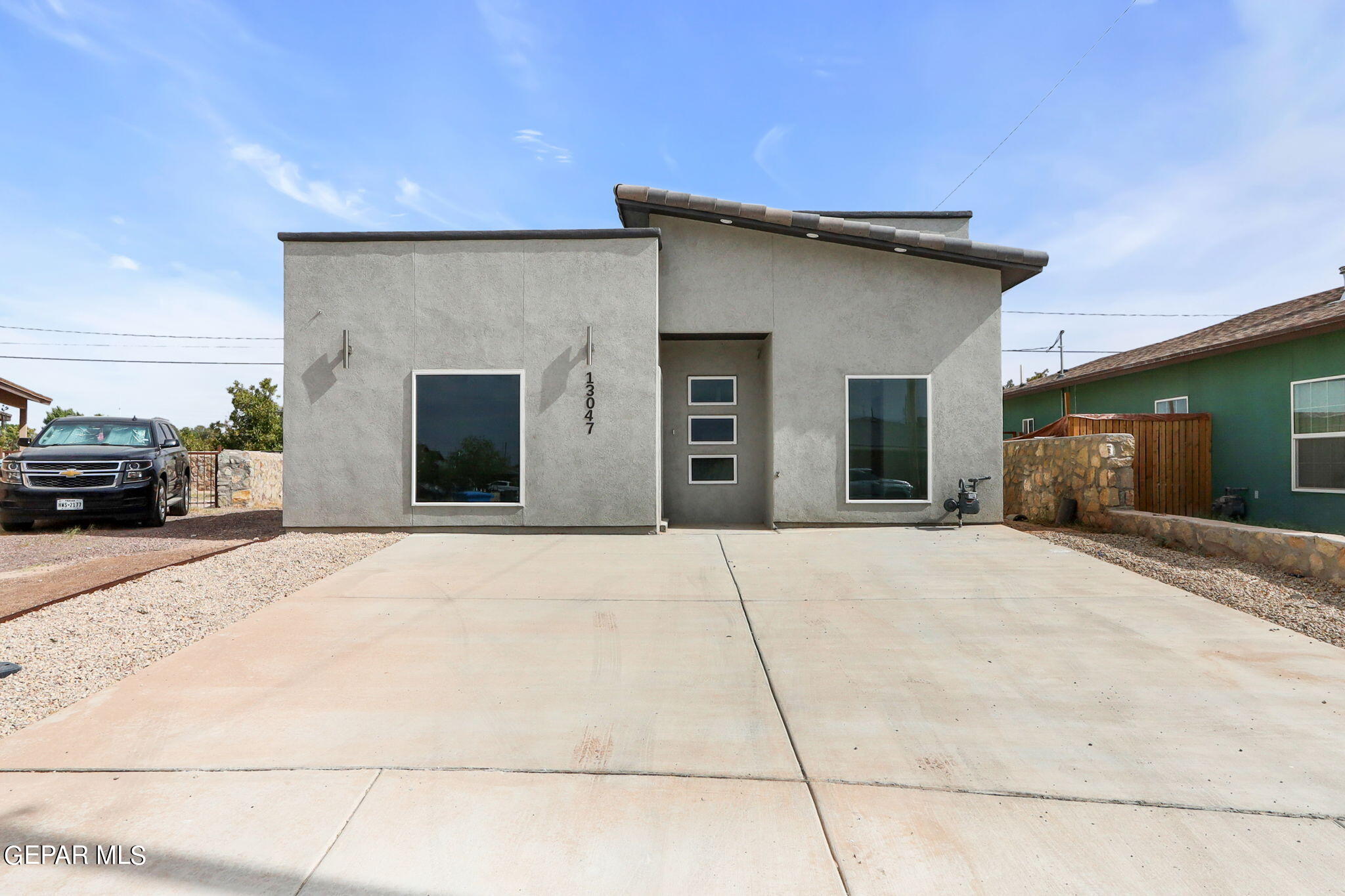 a house view with a outdoor space