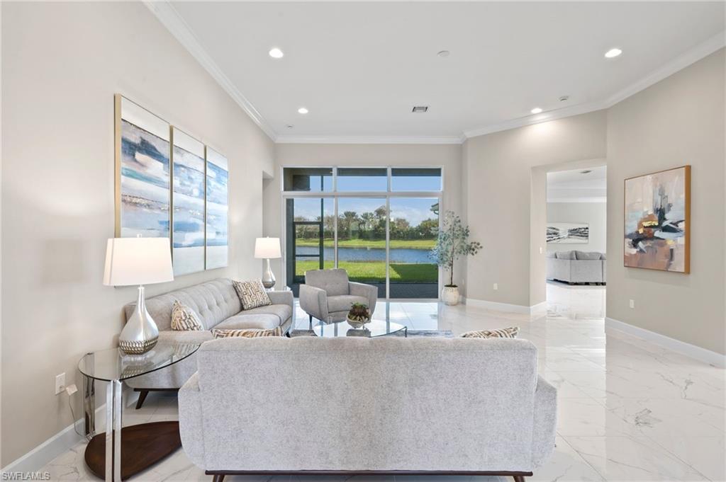 Living room featuring ornamental molding