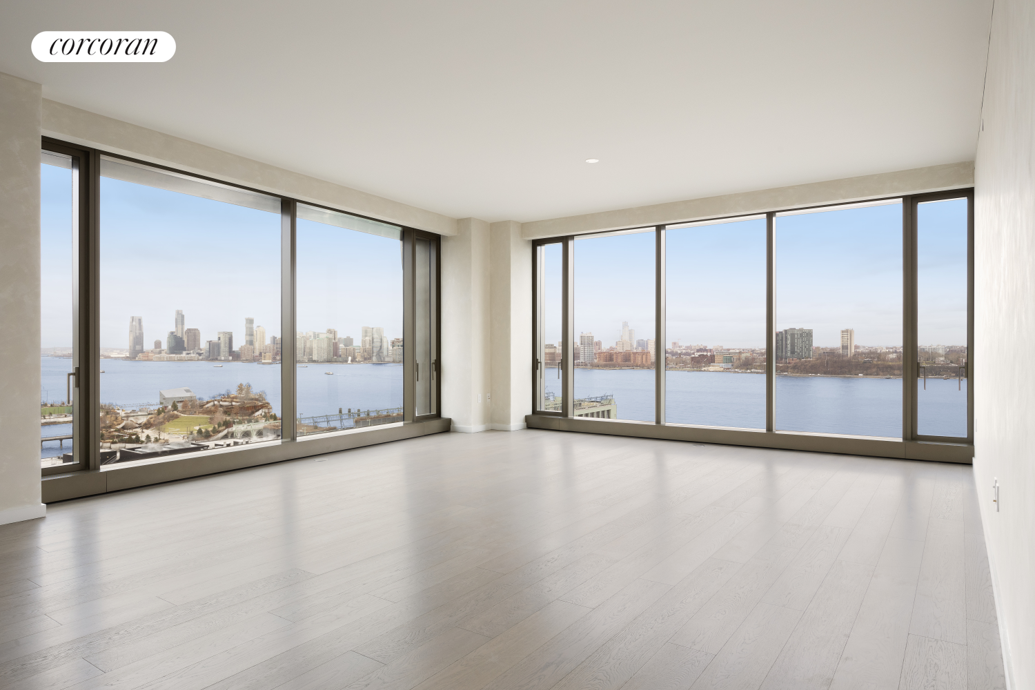 a view of an empty room with a large window