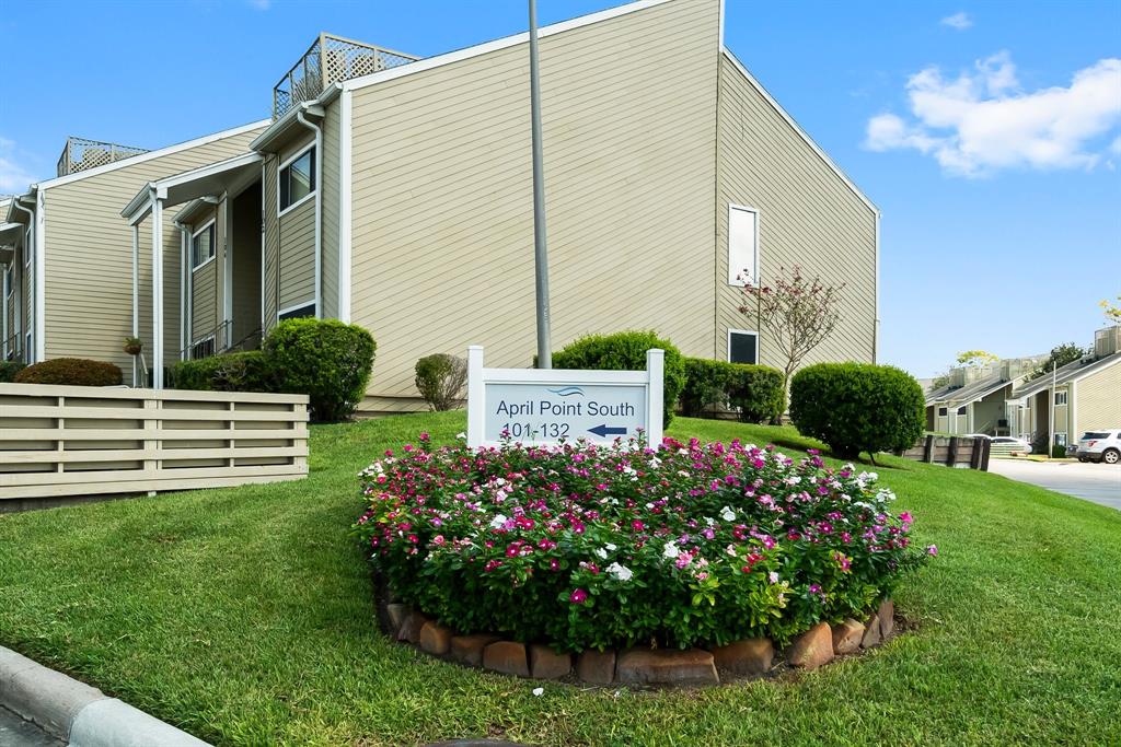 a view of a house with a garden