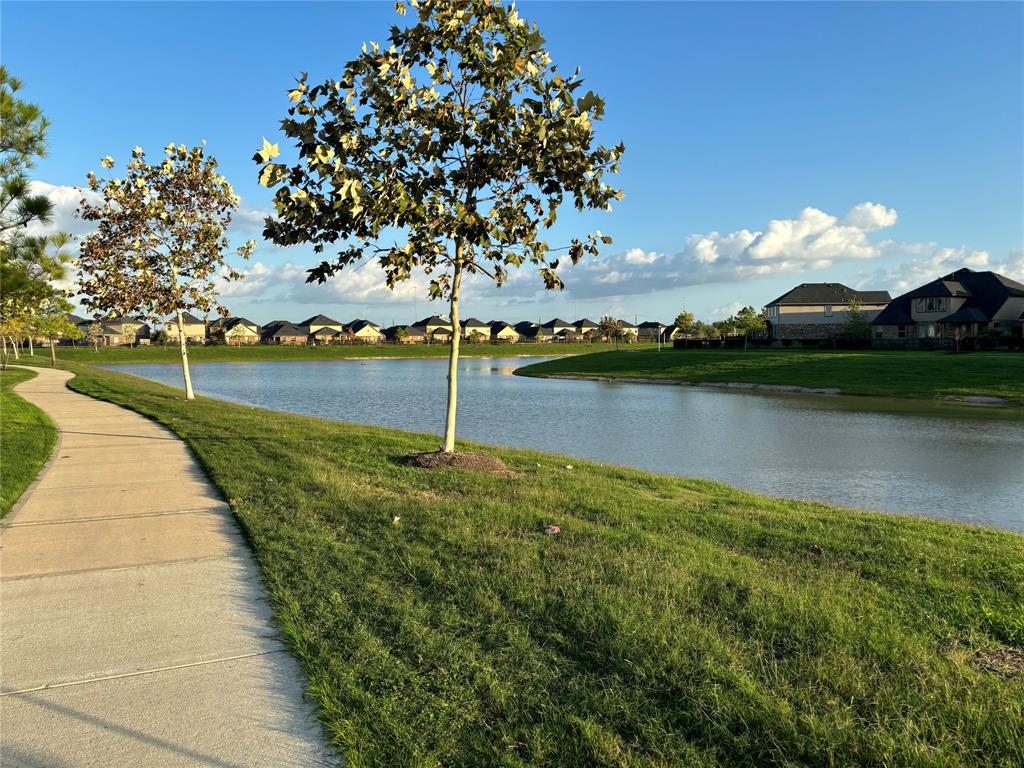 a view of a lake with a big yard