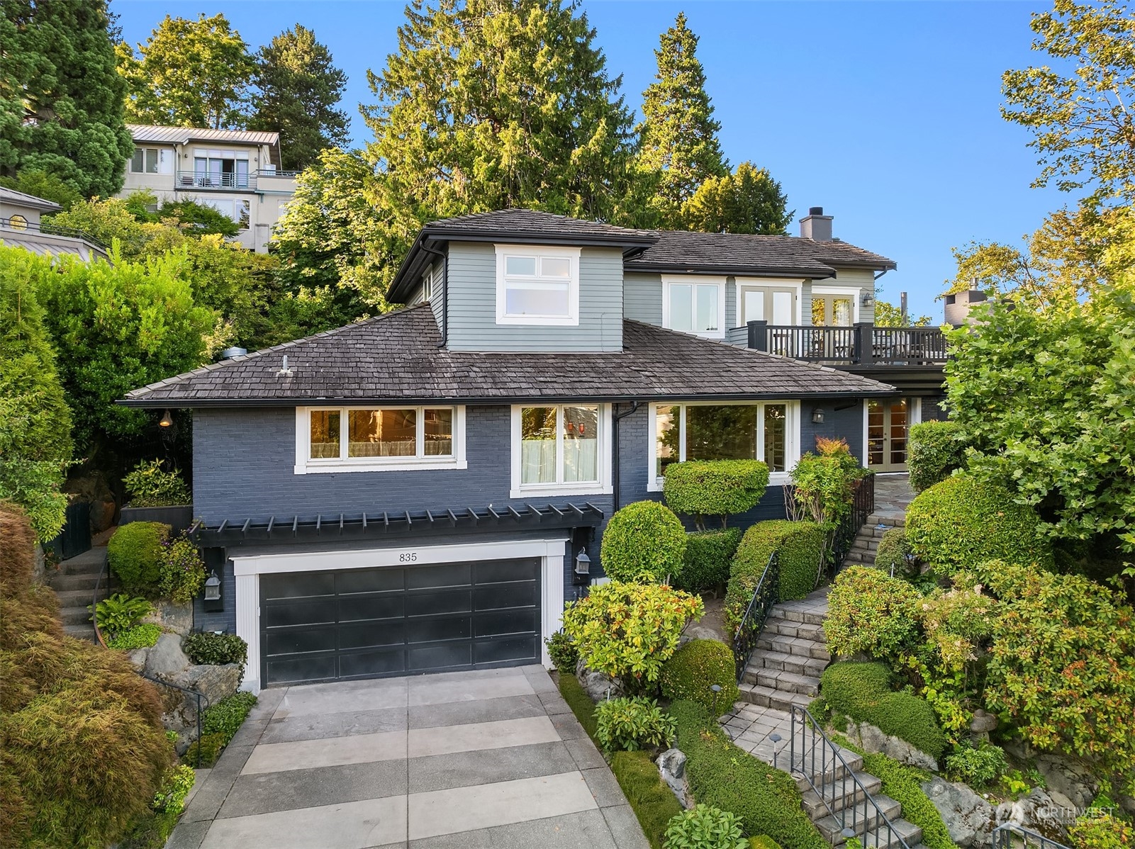 a front view of a house with a yard