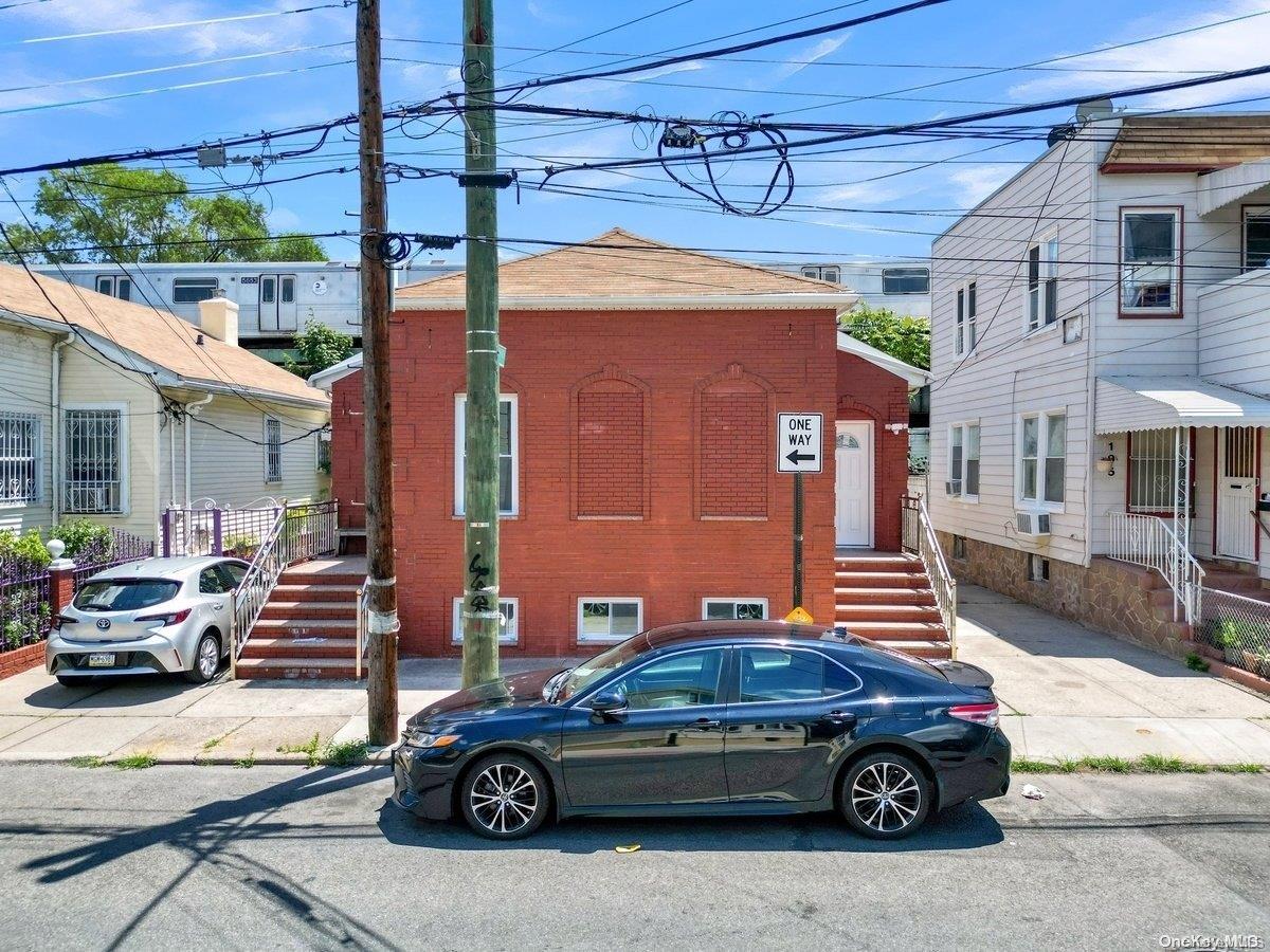 a car parked in front of a building