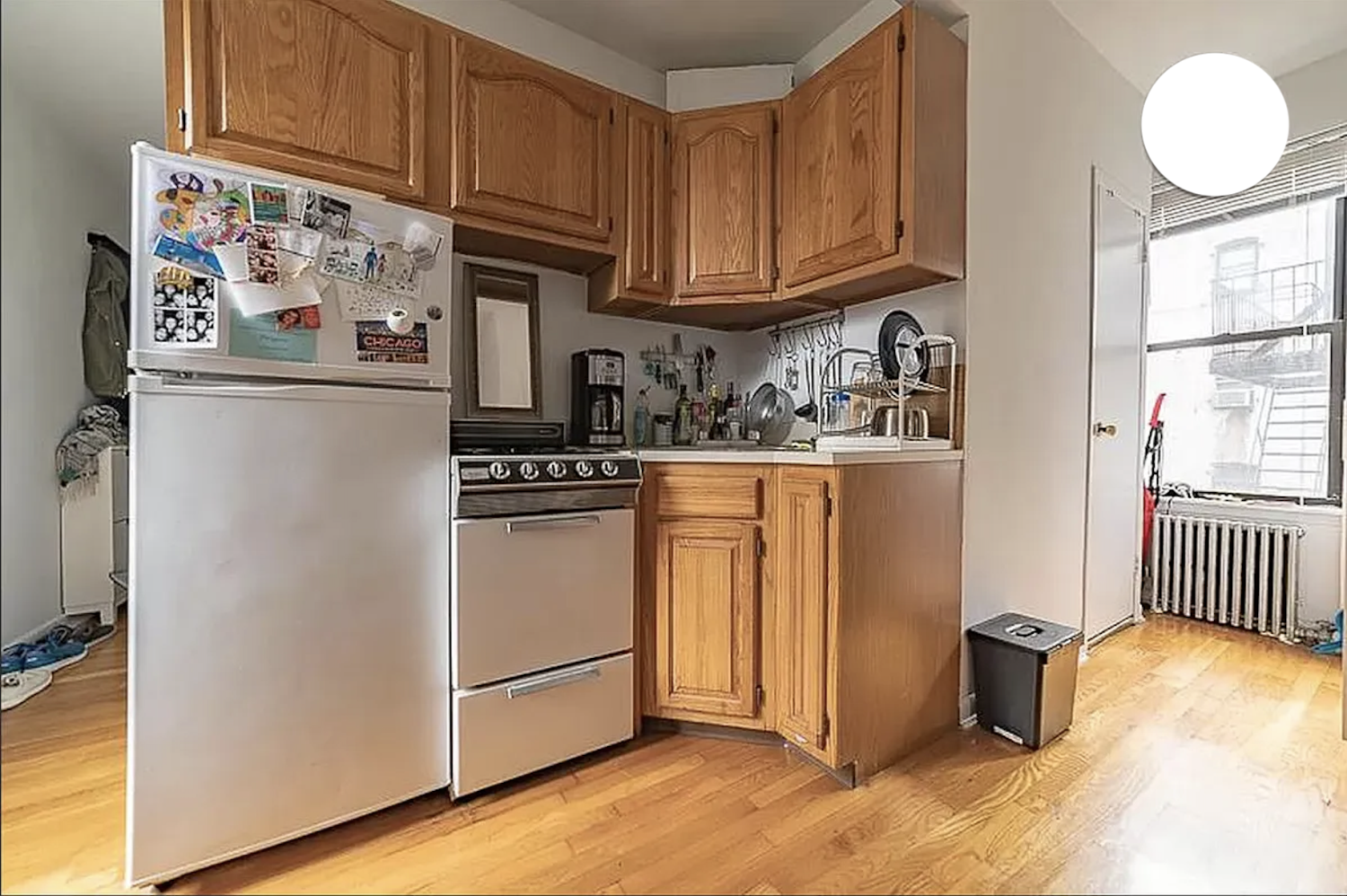 a kitchen with stainless steel appliances granite countertop a refrigerator sink and cabinets