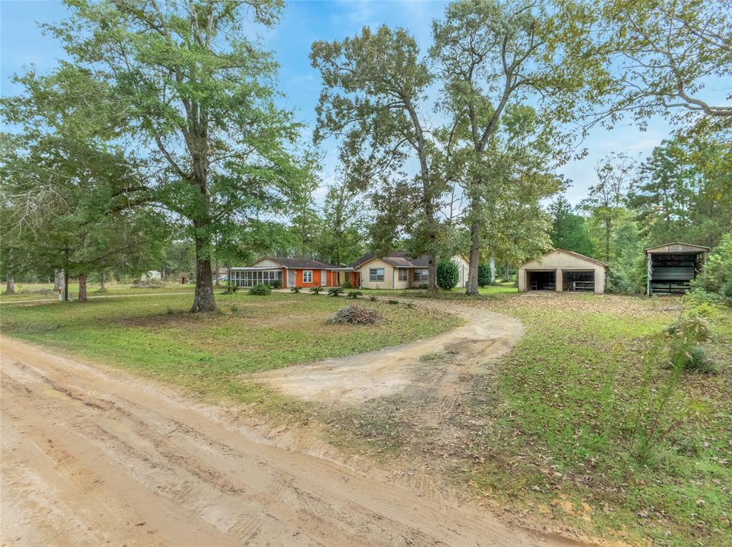 a house with trees in front of it