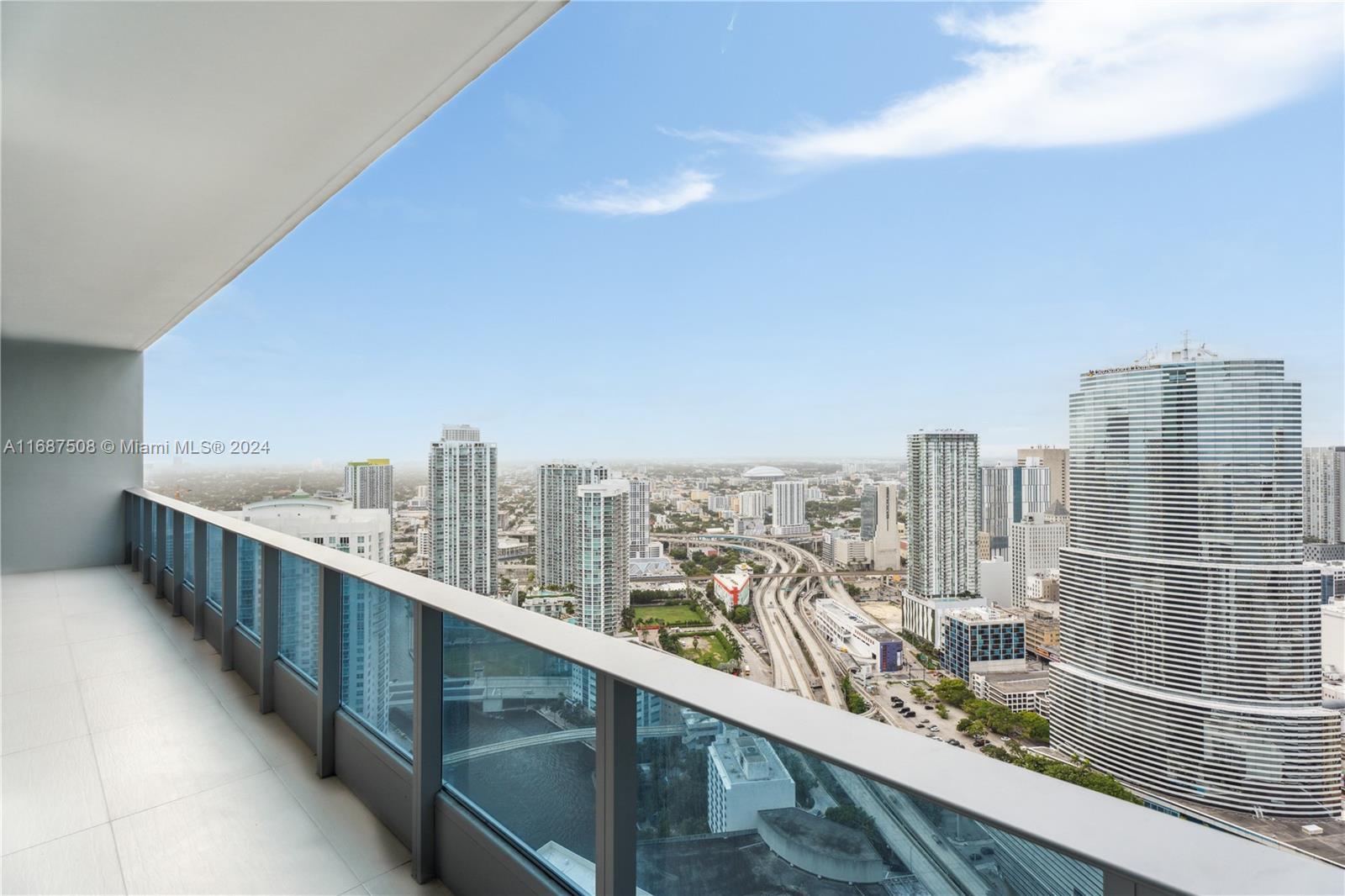 a view of a balcony with city