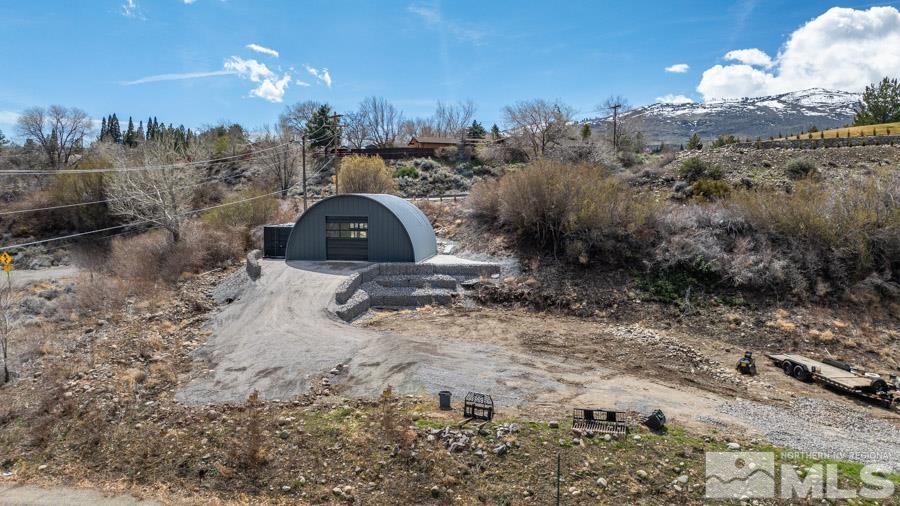 a view of a backyard of a house